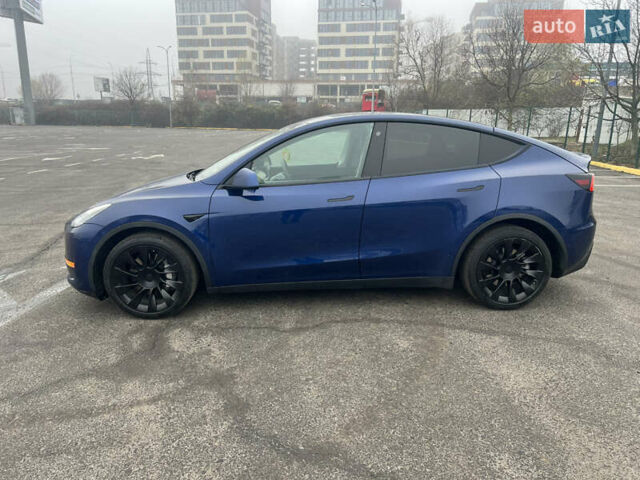 Синий Тесла Model Y, объемом двигателя 0 л и пробегом 125 тыс. км за 25997 $, фото 32 на Automoto.ua
