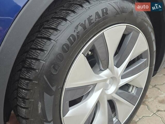 Синий Тесла Model Y, объемом двигателя 0 л и пробегом 99 тыс. км за 25500 $, фото 16 на Automoto.ua