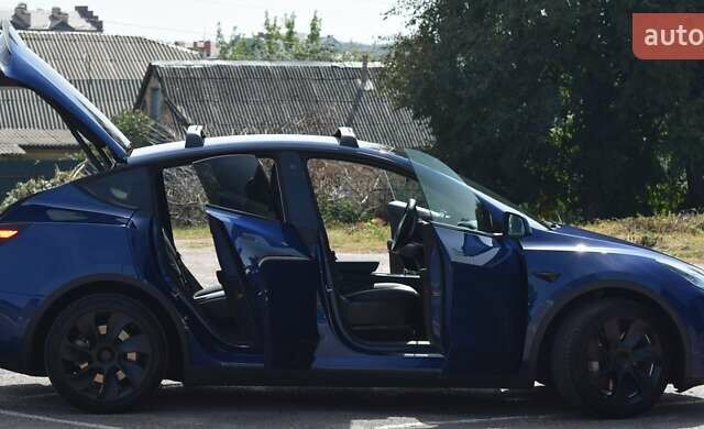 Синий Тесла Model Y, объемом двигателя 0 л и пробегом 81 тыс. км за 25499 $, фото 20 на Automoto.ua
