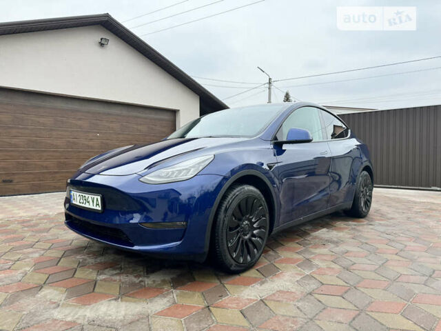 Синій Тесла Model Y, об'ємом двигуна 0 л та пробігом 65 тис. км за 34000 $, фото 1 на Automoto.ua