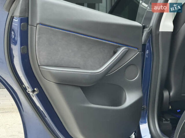 Синий Тесла Model Y, объемом двигателя 0 л и пробегом 88 тыс. км за 31990 $, фото 33 на Automoto.ua