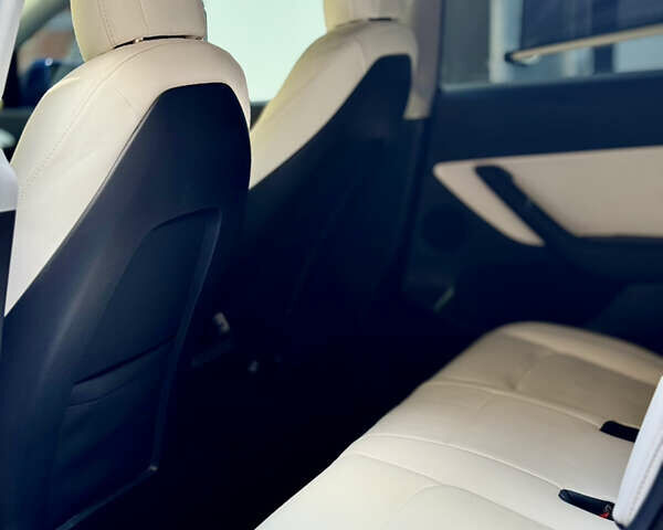 Тесла Model Y 2021 в Белой Церкве на Automoto.ua Синий Тесла Model Y, объемом двигателя 0 л и пробегом 76 тыс. км за 26500 $, фото 13 на Automoto.ua