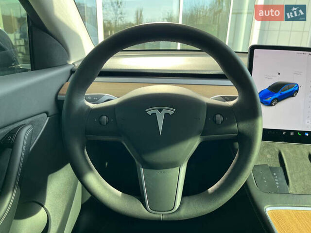 Синий Тесла Model Y, объемом двигателя 0 л и пробегом 35 тыс. км за 30100 $, фото 13 на Automoto.ua