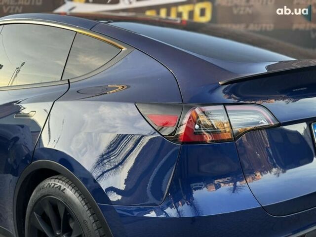 Синий Тесла Model Y, объемом двигателя 0 л и пробегом 83 тыс. км за 28000 $, фото 29 на Automoto.ua