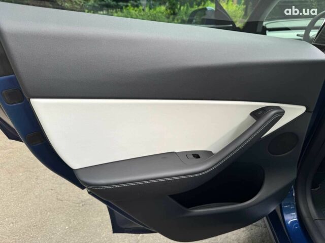 Тесла Model Y 2021 в Киеве на Automoto.ua Синий Тесла Model Y, объемом двигателя 0 л и пробегом 86 тыс. км за 19390 $, фото 18 на Automoto.ua