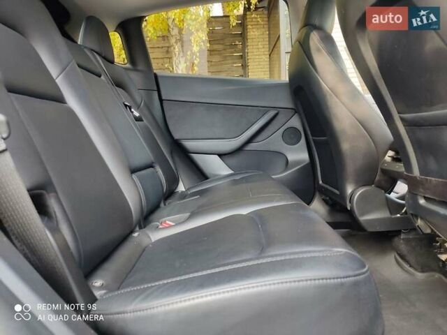 Синий Тесла Model Y, объемом двигателя 0 л и пробегом 58 тыс. км за 24000 $, фото 12 на Automoto.ua
