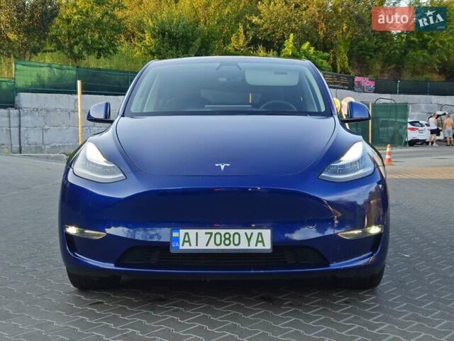 Синий Тесла Model Y, объемом двигателя 0 л и пробегом 99 тыс. км за 26500 $, фото 10 на Automoto.ua