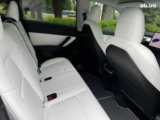 Тесла Model Y 2021 в Киеве на Automoto.ua Синий Тесла Model Y, объемом двигателя 0 л и пробегом 86 тыс. км за 19390 $, фото 23 на Automoto.ua