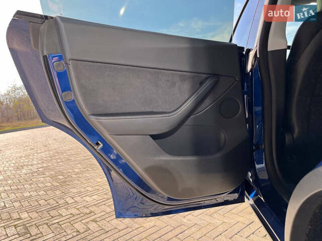 Синий Тесла Model Y, объемом двигателя 0 л и пробегом 35 тыс. км за 30100 $, фото 25 на Automoto.ua