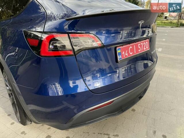 Синий Тесла Model Y, объемом двигателя 0 л и пробегом 86 тыс. км за 25900 $, фото 62 на Automoto.ua