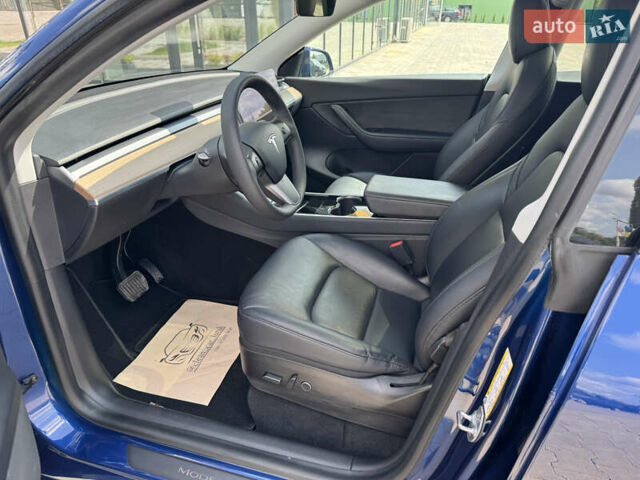 Синий Тесла Model Y, объемом двигателя 0 л и пробегом 83 тыс. км за 24999 $, фото 13 на Automoto.ua