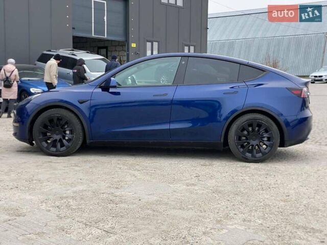 Синій Тесла Model Y, об'ємом двигуна 0 л та пробігом 91 тис. км за 25990 $, фото 6 на Automoto.ua