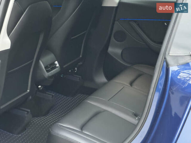 Синий Тесла Model Y, объемом двигателя 0 л и пробегом 88 тыс. км за 31990 $, фото 32 на Automoto.ua