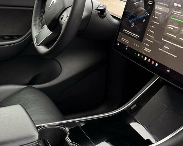 Синий Тесла Model Y, объемом двигателя 0 л и пробегом 93 тыс. км за 18800 $, фото 5 на Automoto.ua