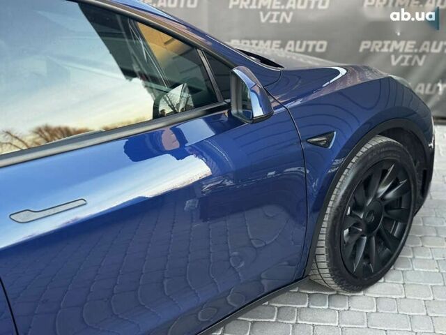 Синий Тесла Model Y, объемом двигателя 0 л и пробегом 83 тыс. км за 28000 $, фото 26 на Automoto.ua