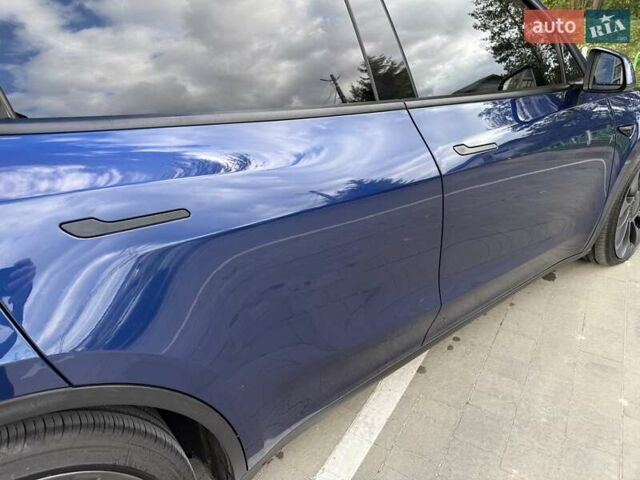 Синий Тесла Model Y, объемом двигателя 0 л и пробегом 86 тыс. км за 25900 $, фото 68 на Automoto.ua