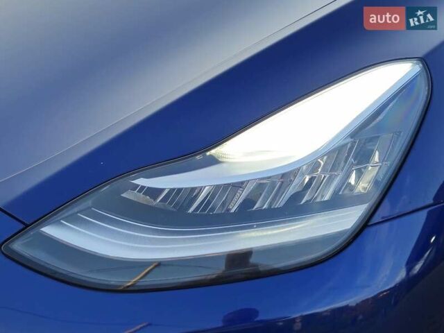 Синий Тесла Model Y, объемом двигателя 0 л и пробегом 99 тыс. км за 26500 $, фото 35 на Automoto.ua