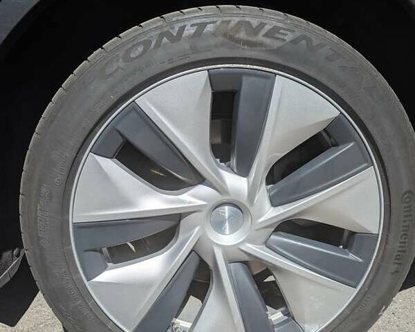 Синий Тесла Model Y, объемом двигателя 0 л и пробегом 84 тыс. км за 28500 $, фото 1 на Automoto.ua