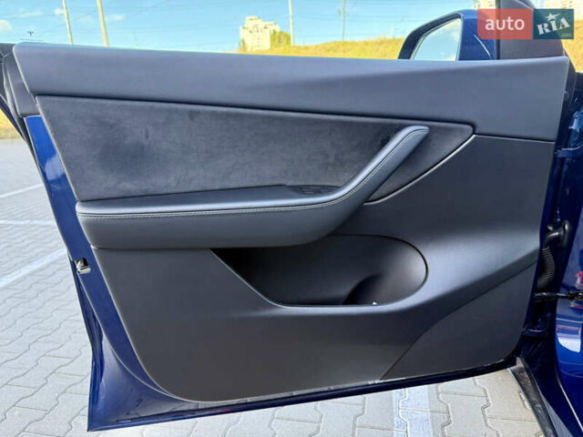Синий Тесла Model Y, объемом двигателя 0 л и пробегом 48 тыс. км за 27500 $, фото 14 на Automoto.ua