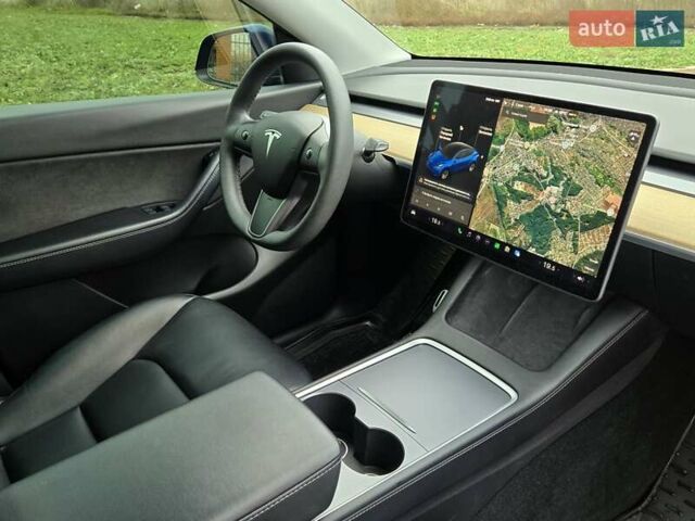 Синий Тесла Model Y, объемом двигателя 0 л и пробегом 99 тыс. км за 25500 $, фото 23 на Automoto.ua