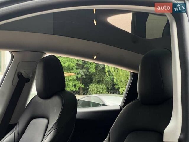 Синий Тесла Model Y, объемом двигателя 0 л и пробегом 66 тыс. км за 25500 $, фото 13 на Automoto.ua