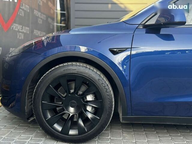 Синий Тесла Model Y, объемом двигателя 0 л и пробегом 83 тыс. км за 28000 $, фото 14 на Automoto.ua