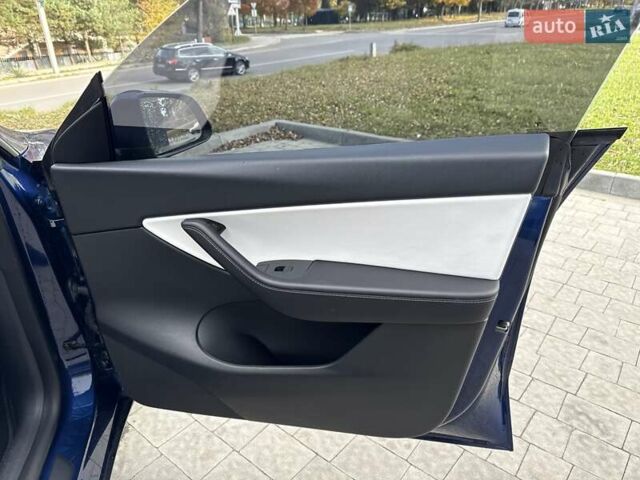 Синій Тесла Model Y, об'ємом двигуна 0 л та пробігом 88 тис. км за 22999 $, фото 50 на Automoto.ua