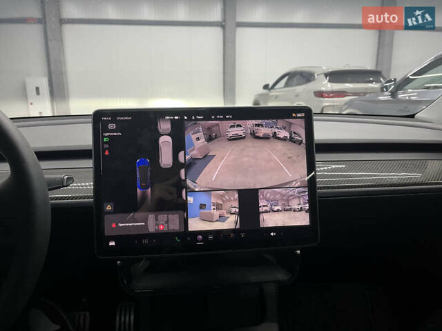 Синий Тесла Model Y, объемом двигателя 0 л и пробегом 68 тыс. км за 29900 $, фото 9 на Automoto.ua