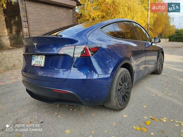 Синий Тесла Model Y, объемом двигателя 0 л и пробегом 58 тыс. км за 24000 $, фото 2 на Automoto.ua