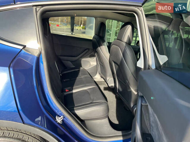 Синий Тесла Model Y, объемом двигателя 0 л и пробегом 35 тыс. км за 30100 $, фото 19 на Automoto.ua