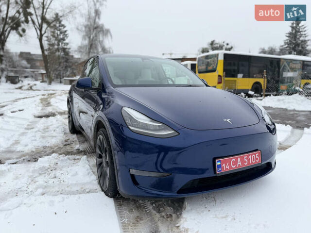 Синий Тесла Model Y, объемом двигателя 0 л и пробегом 63 тыс. км за 27000 $, фото 2 на Automoto.ua