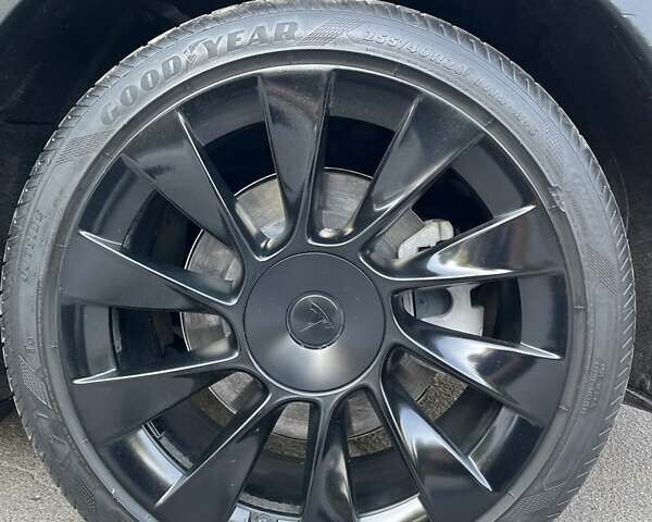 Синий Тесла Model Y, объемом двигателя 0 л и пробегом 68 тыс. км за 25000 $, фото 15 на Automoto.ua