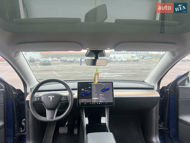 Синий Тесла Model Y, объемом двигателя 0 л и пробегом 125 тыс. км за 25997 $, фото 6 на Automoto.ua