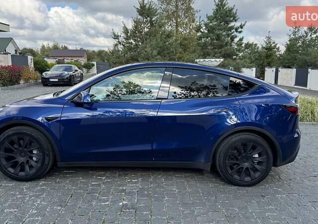 Синій Тесла Model Y, об'ємом двигуна 0 л та пробігом 66 тис. км за 28351 $, фото 6 на Automoto.ua