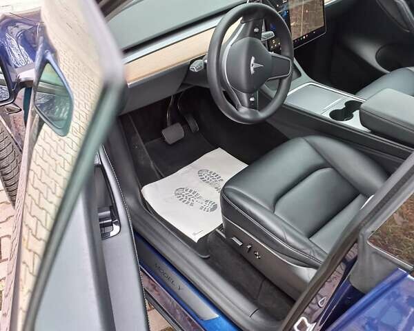 Синий Тесла Model Y, объемом двигателя 0 л и пробегом 91 тыс. км за 25850 $, фото 5 на Automoto.ua
