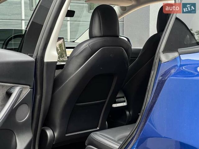 Синий Тесла Model Y, объемом двигателя 0 л и пробегом 66 тыс. км за 25500 $, фото 16 на Automoto.ua