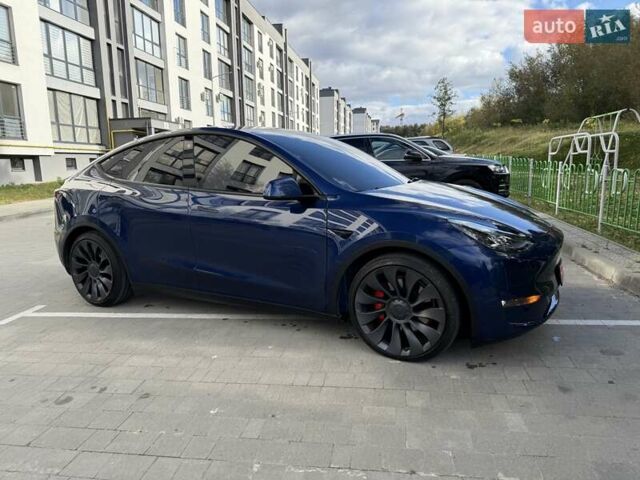 Синий Тесла Model Y, объемом двигателя 0 л и пробегом 86 тыс. км за 25900 $, фото 44 на Automoto.ua