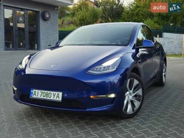 Синий Тесла Model Y, объемом двигателя 0 л и пробегом 99 тыс. км за 26500 $, фото 29 на Automoto.ua