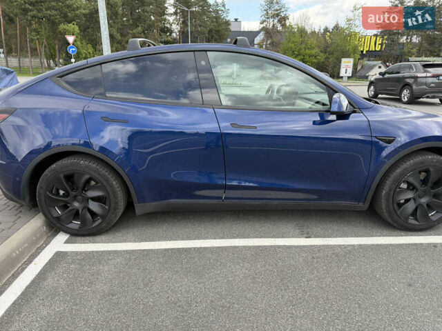 Синій Тесла Model Y, об'ємом двигуна 0 л та пробігом 77 тис. км за 28500 $, фото 3 на Automoto.ua
