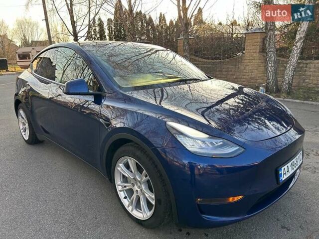 Синий Тесла Model Y, объемом двигателя 0 л и пробегом 62 тыс. км за 25800 $, фото 1 на Automoto.ua