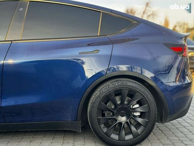 Синий Тесла Model Y, объемом двигателя 0 л и пробегом 83 тыс. км за 28000 $, фото 15 на Automoto.ua