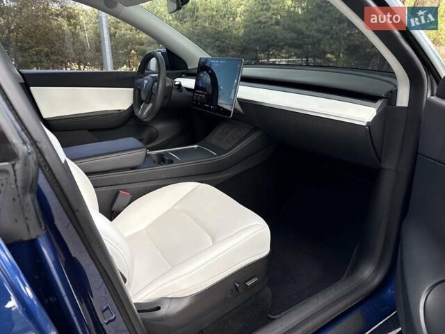 Синій Тесла Model Y, об'ємом двигуна 0 л та пробігом 88 тис. км за 22999 $, фото 48 на Automoto.ua