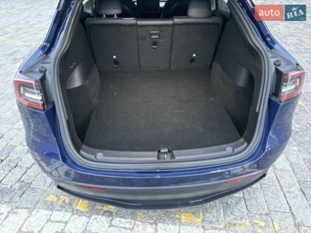 Тесла Model Y 2021 в Харькове на Automoto.ua Синий Тесла Model Y, объемом двигателя 0 л и пробегом 113 тыс. км за 21200 $, фото 95 на Automoto.ua