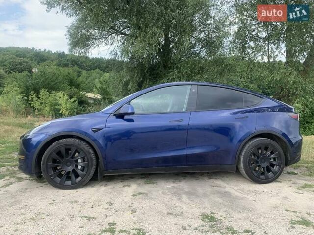 Синий Тесла Model Y, объемом двигателя 0 л и пробегом 75 тыс. км за 22900 $, фото 3 на Automoto.ua
