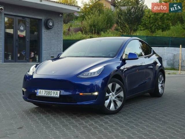 Синий Тесла Model Y, объемом двигателя 0 л и пробегом 99 тыс. км за 26500 $, фото 4 на Automoto.ua
