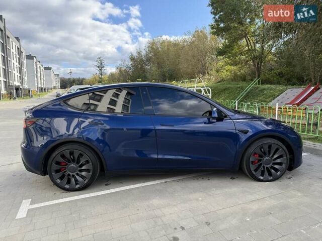 Синий Тесла Model Y, объемом двигателя 0 л и пробегом 86 тыс. км за 25900 $, фото 45 на Automoto.ua