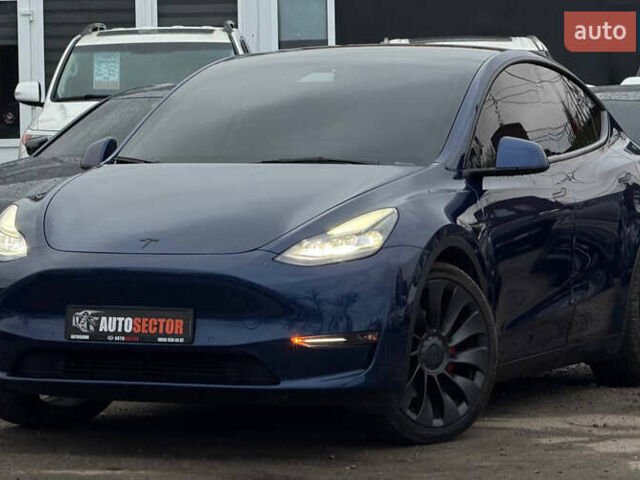 Синий Тесла Model Y, объемом двигателя 0 л и пробегом 114 тыс. км за 24800 $, фото 1 на Automoto.ua