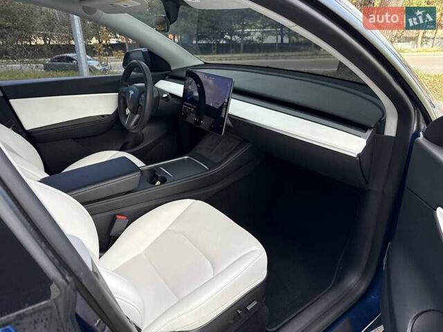 Синий Тесла Model Y, объемом двигателя 0 л и пробегом 87 тыс. км за 23999 $, фото 43 на Automoto.ua