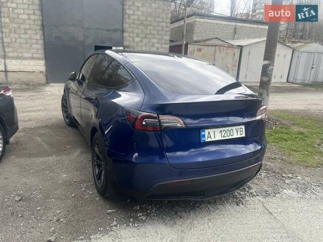 Синий Тесла Model Y, объемом двигателя 0 л и пробегом 101 тыс. км за 23999 $, фото 3 на Automoto.ua