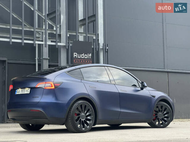 Синий Тесла Model Y, объемом двигателя 0 л и пробегом 88 тыс. км за 31990 $, фото 3 на Automoto.ua